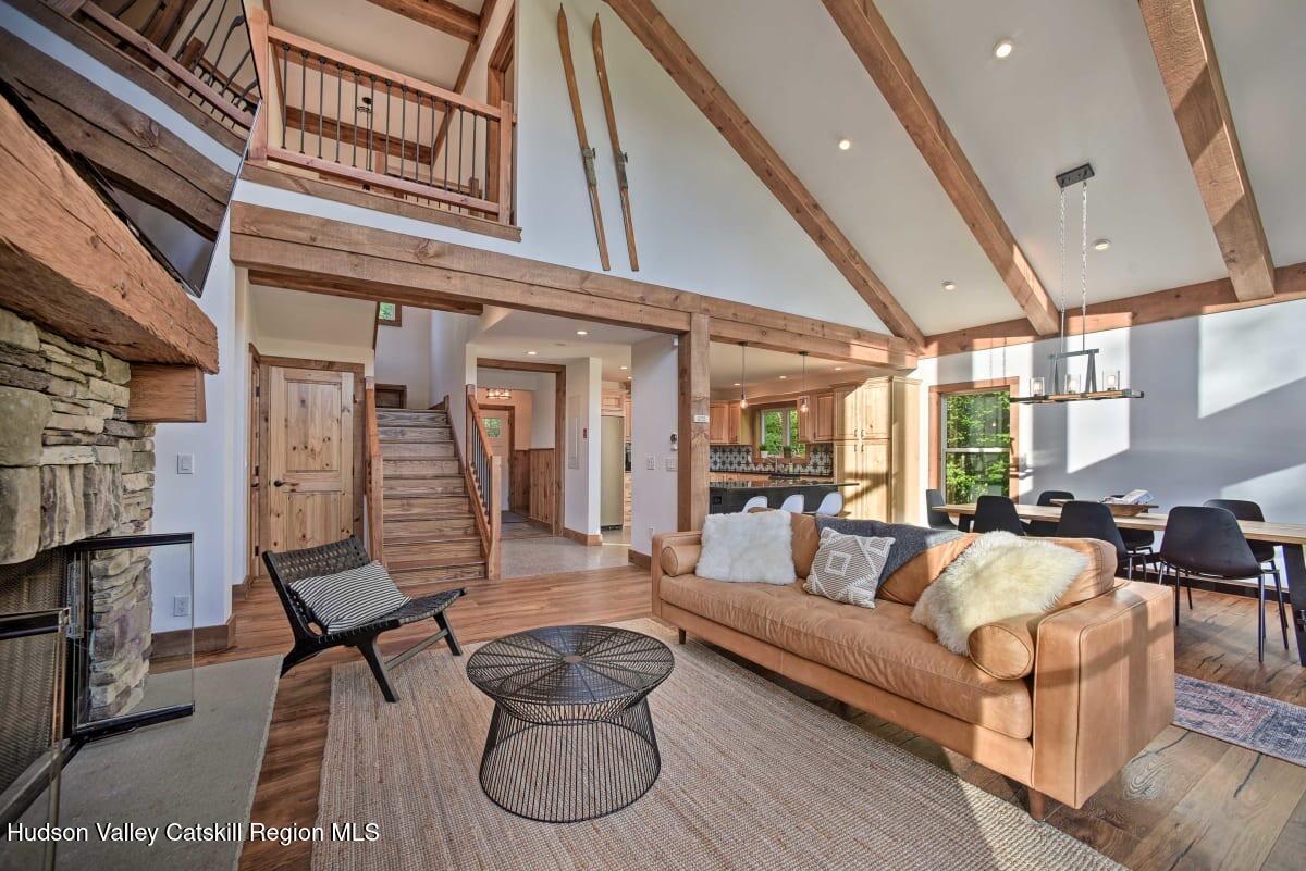 205 Nauvoo Road Windham, NY 12496 - Photo 10 of 31 a living room with furniture and a flat screen tv