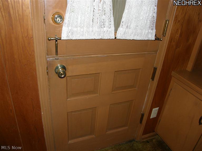 7243 Chillicothe Road Mentor, OH 44060 - Photo 21 of 23 The family room has a real Dutch door, the kind you can keep closed on the bottom and open at the top.