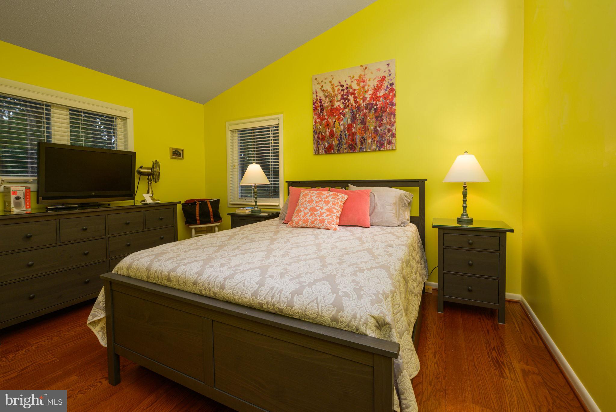 10 Gloucester Road Ocean Pines, MD 21811 - Photo 25 of 37 a bedroom with a bed and a flat screen tv