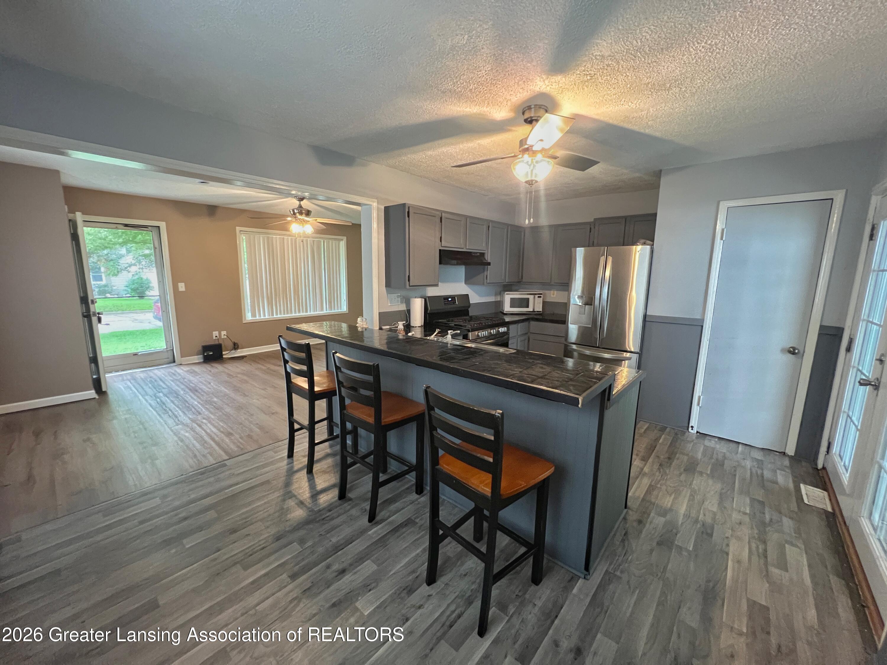 6935 Cooper Road Lansing, MI 48911 - Photo 4 of 27 IMG_6041