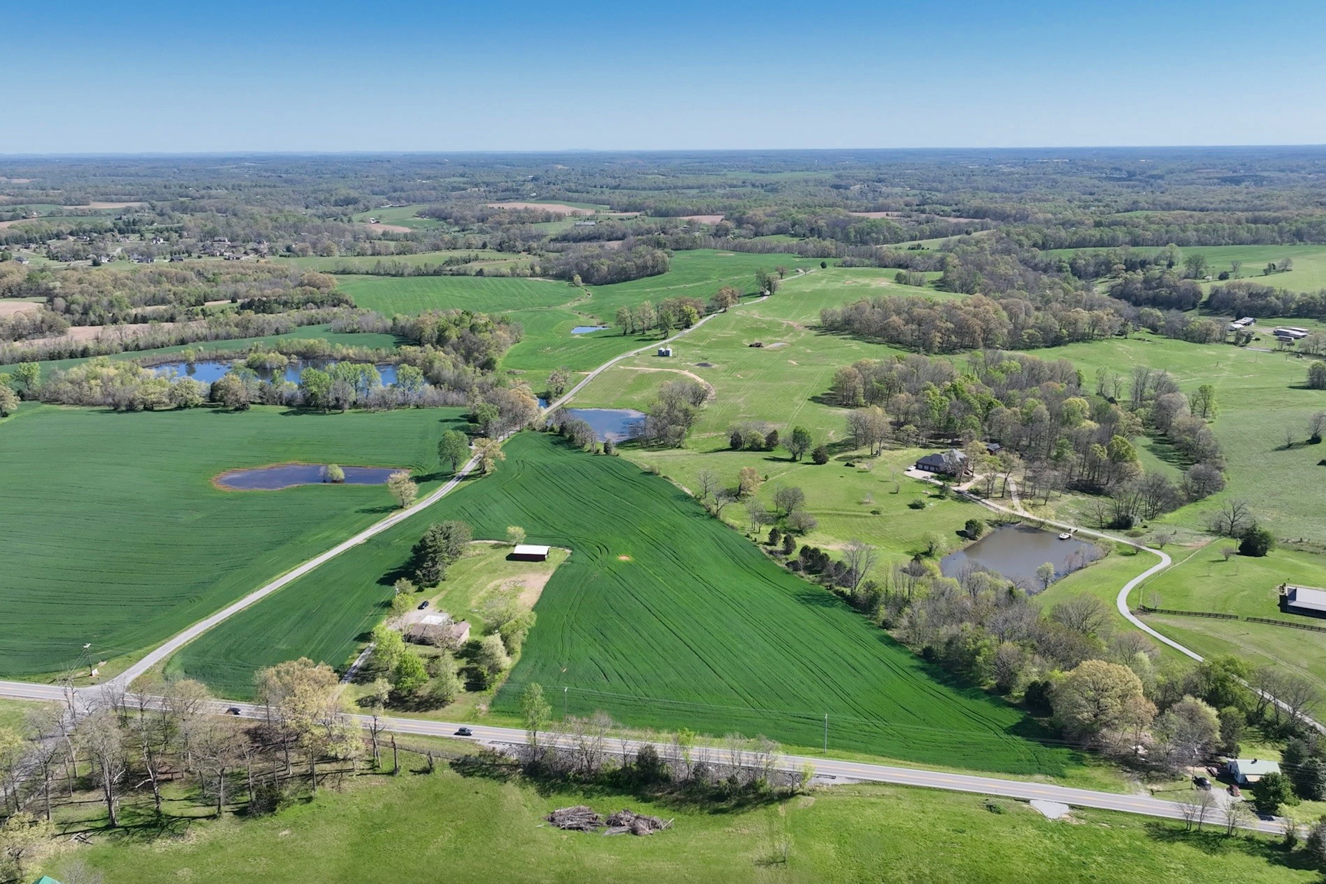 0 Mt Zion Road Springfield, TN 37172 - Photo 5 of 18 an aerial view of a city with lots of residential buildings and mountain view in back
