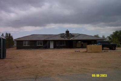 15190 Apache Road Apple Valley, CA 92307 - Photo 1 of 1 a front view of house with yard