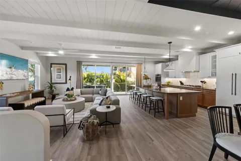 a bedroom with a bed and a potted plant