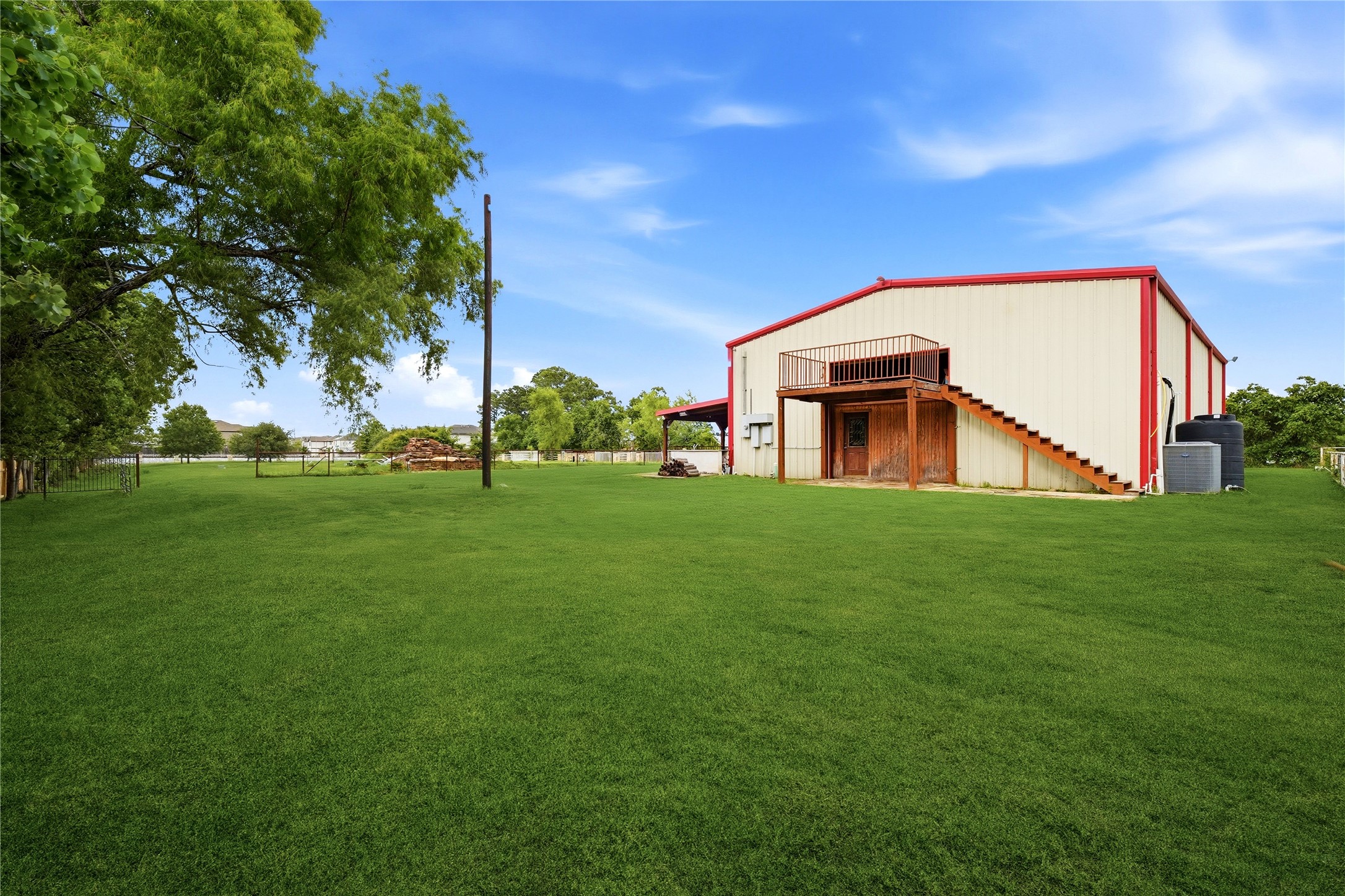11741 Ezekiel Road Tomball, TX 77375 - Photo 8 of 30 a front view of house with garden