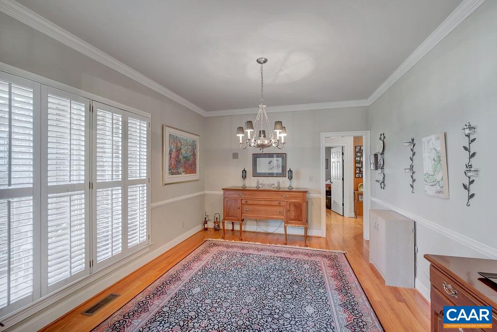 1990 River Inn Lane Charlottesville, VA 22901 - Photo 14 of 48 a living room with furniture and a chandelier