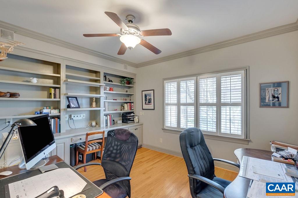 1990 River Inn Lane Charlottesville, VA 22901 - Photo 16 of 48 a view of a workspace with furniture and a window