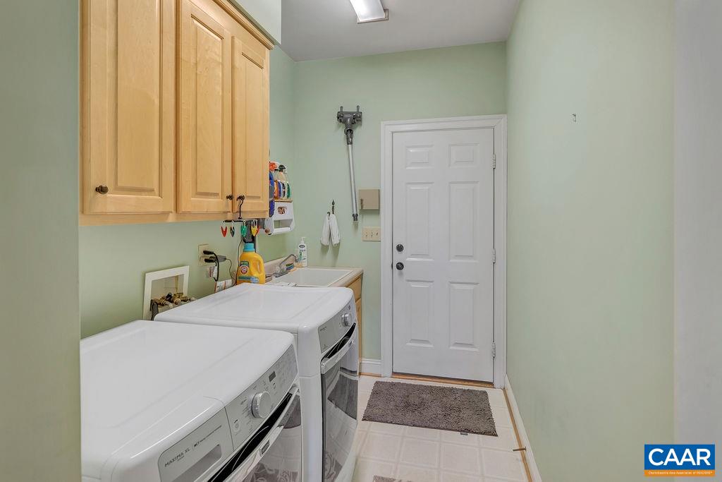 1990 River Inn Lane Charlottesville, VA 22901 - Photo 24 of 48 a room with a bed and a cabinet