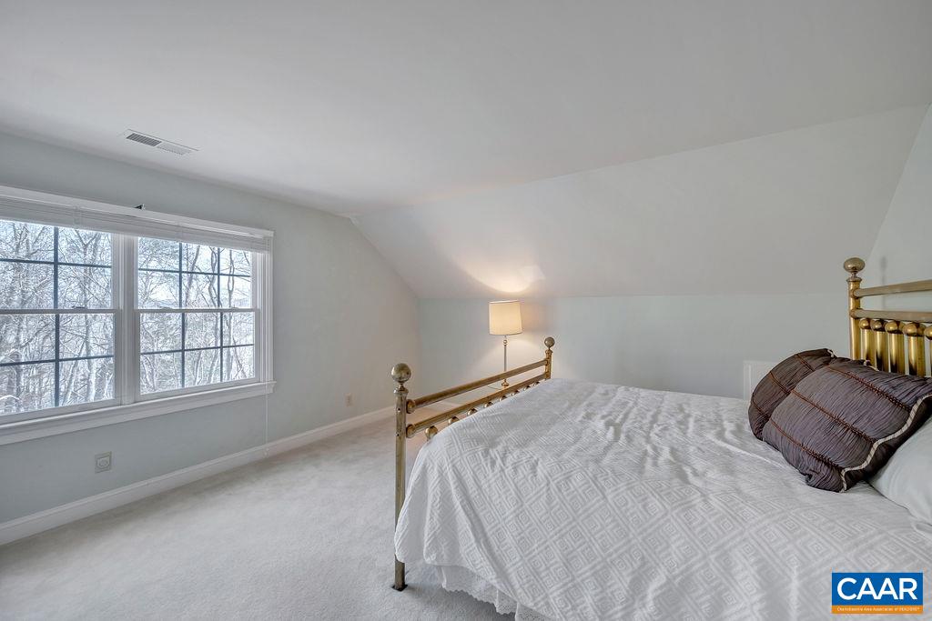 1990 River Inn Lane Charlottesville, VA 22901 - Photo 27 of 48 a bedroom with a bed and window