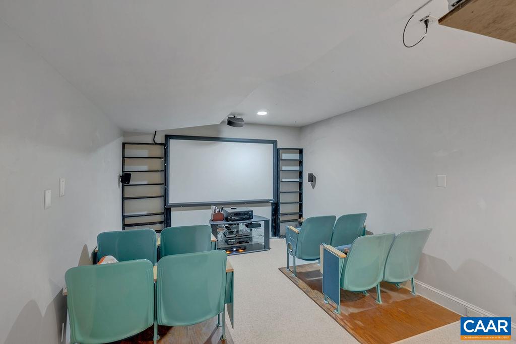 1990 River Inn Lane Charlottesville, VA 22901 - Photo 34 of 48 a living room with furniture and a wooden floor