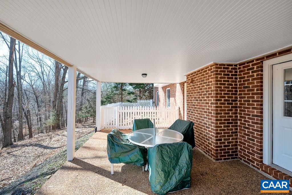1990 River Inn Lane Charlottesville, VA 22901 - Photo 43 of 48 a living room with furniture and a floor to ceiling window