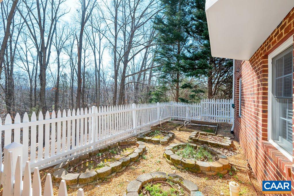 1990 River Inn Lane Charlottesville, VA 22901 - Photo 45 of 48 a view of a backyard with a large tree