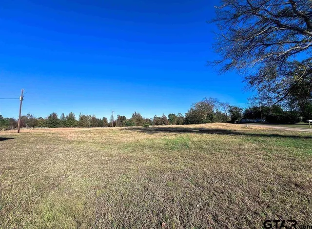 a view of lake with sunset