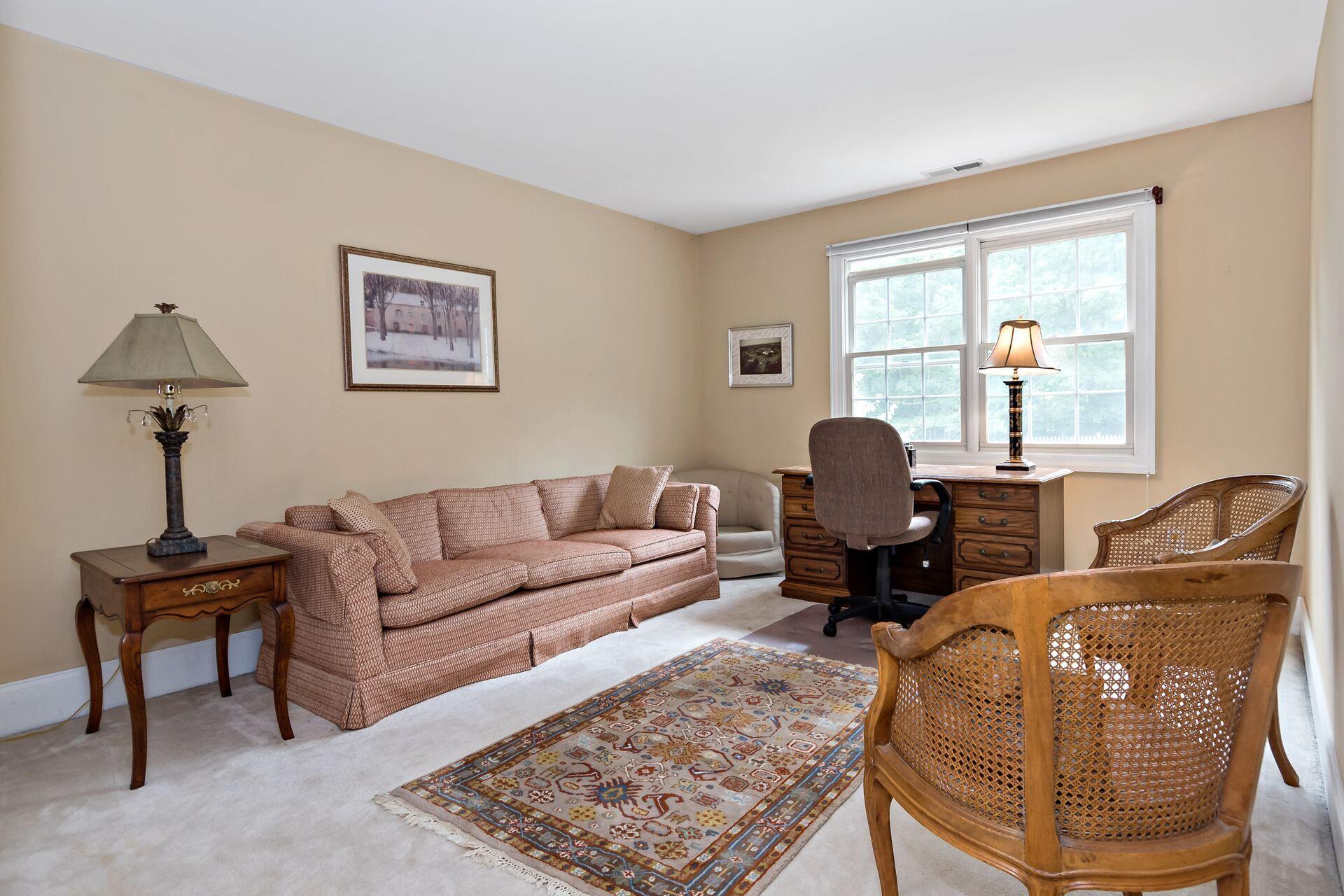 4 Silvermine Ridge Norwalk, CT 06850 - Photo 22 of 29 a living room with furniture and a window