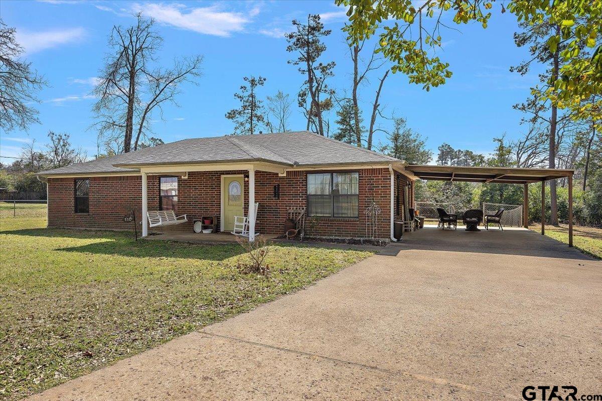 110 Earl Street Rusk, TX 75785 - Photo 28 of 29 a front view of a house with garden