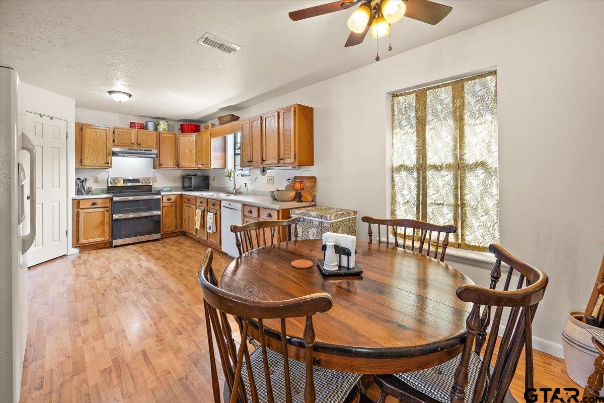 110 Earl Street Rusk, TX 75785 - Photo 9 of 29 a view of a dining room with furniture window and outside view