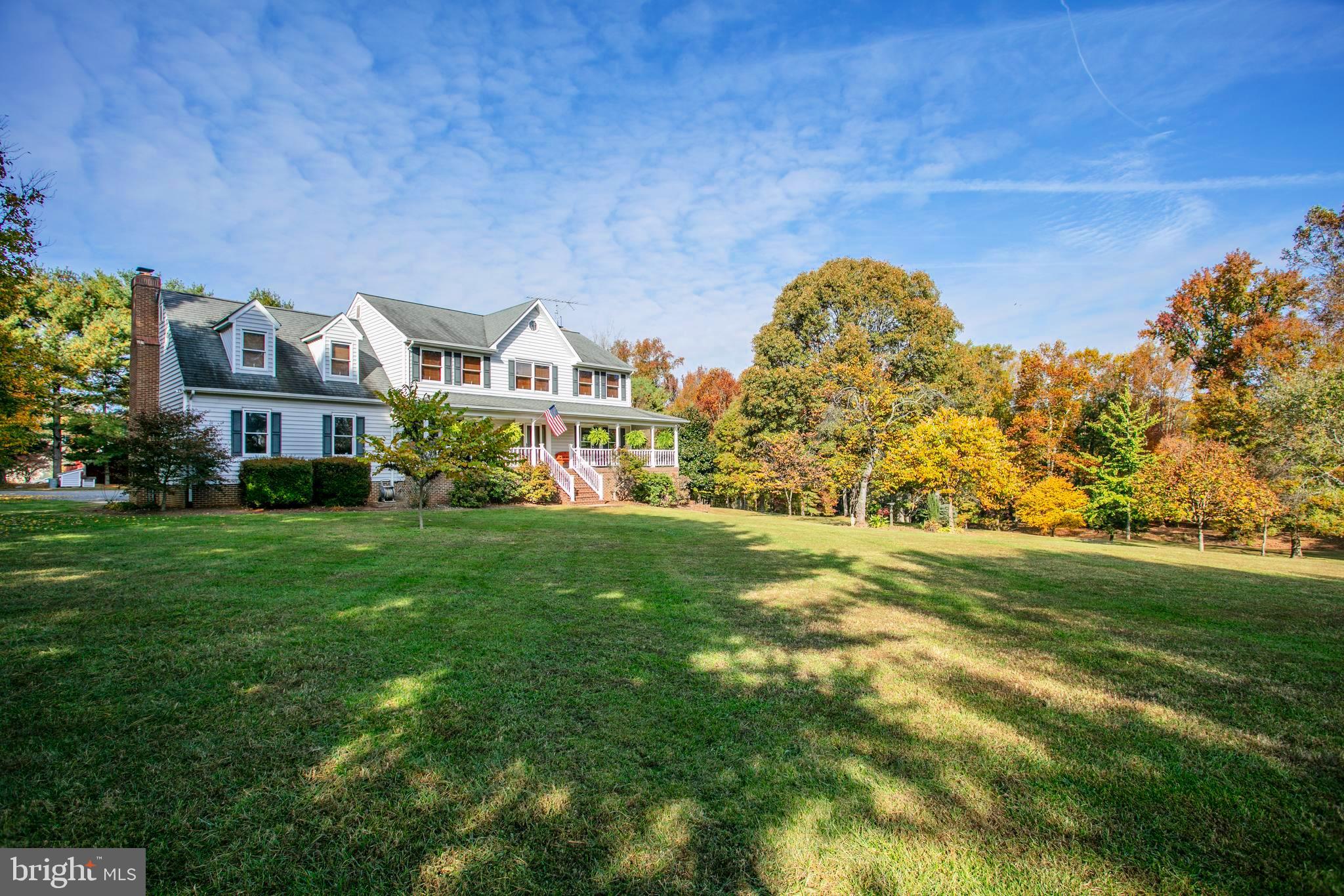 12117 Salem Church Road King George, VA 22485 - Photo 30 of 34 a front view of a house with a garden