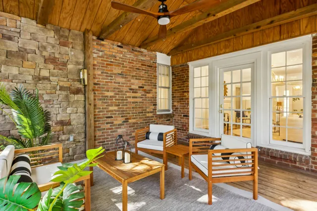 a backyard of a house with seating space