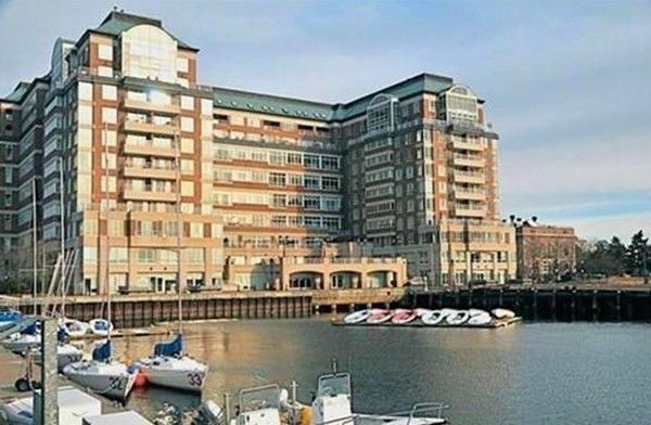 a front view of a building with lake view