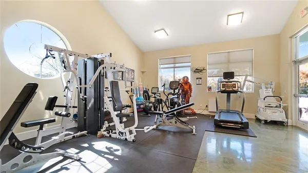 a view of a room with gym equipment