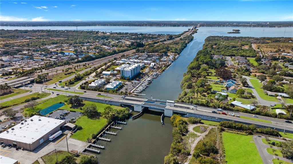 104 Parrotfish Lane, Unit 104 Merritt Island, FL 32953 - Photo 30 of 34 an aerial view of a residential houses with outdoor space