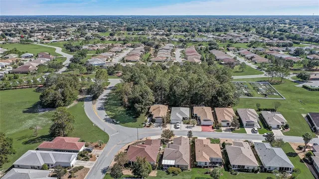 an aerial view of a house with a garden