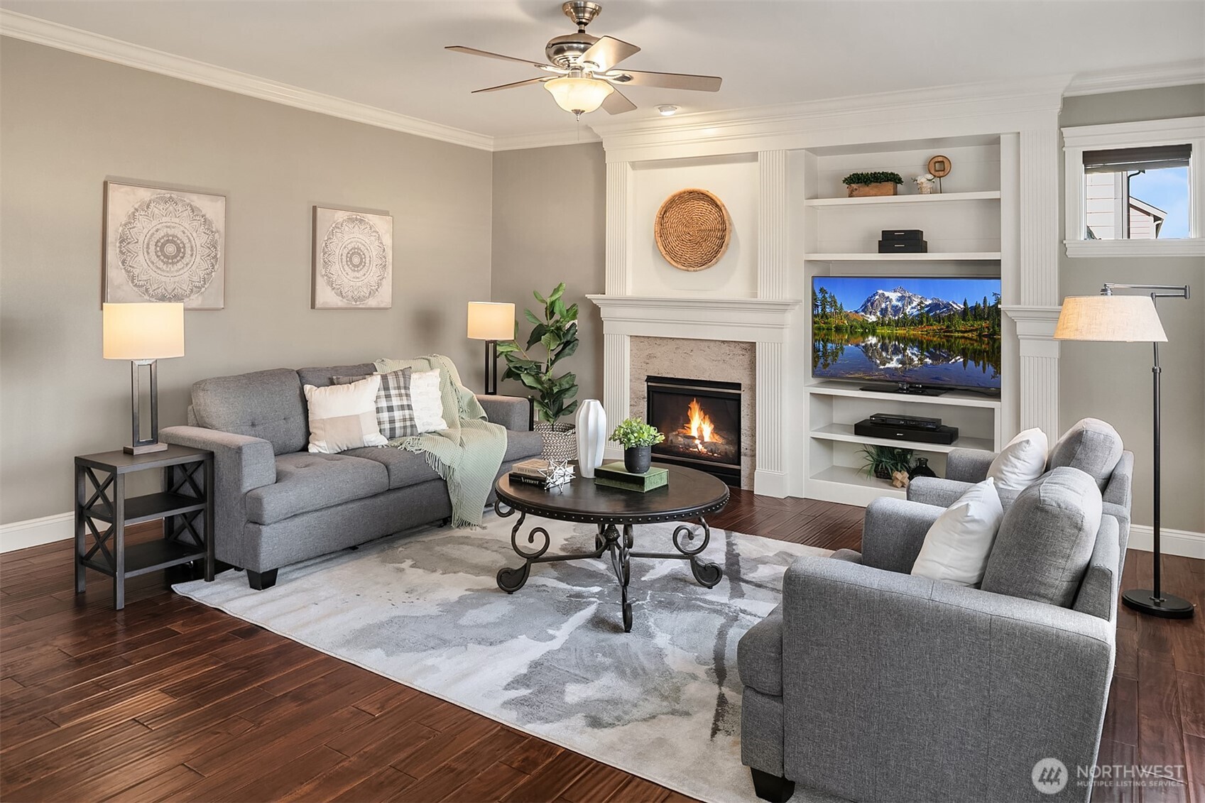 22632 Southeast 281st Street Maple Valley, WA 98038 - Photo 13 of 24 a living room with furniture and a fireplace