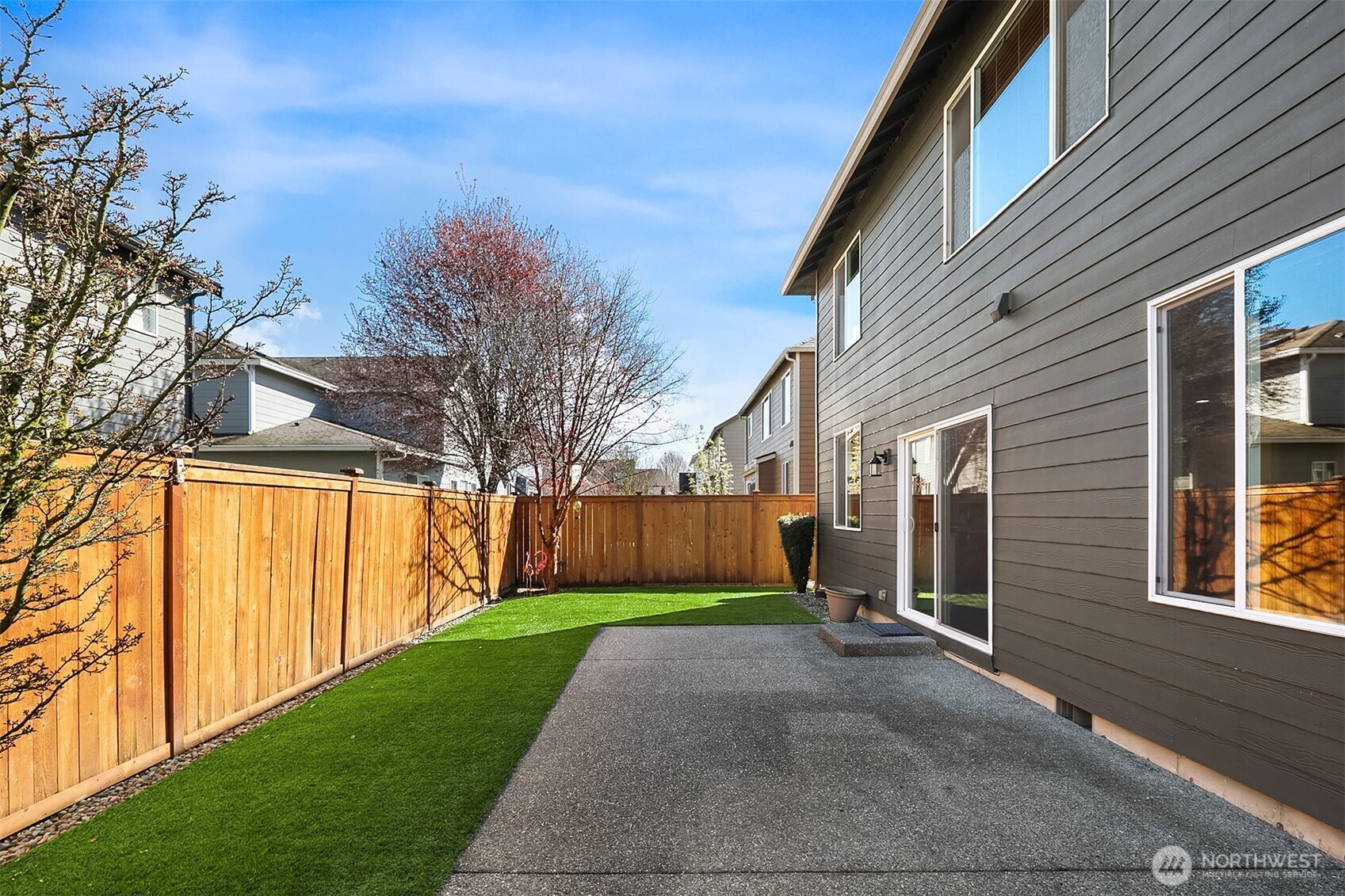 22632 Southeast 281st Street Maple Valley, WA 98038 - Photo 24 of 24 a view of a back yard of the house