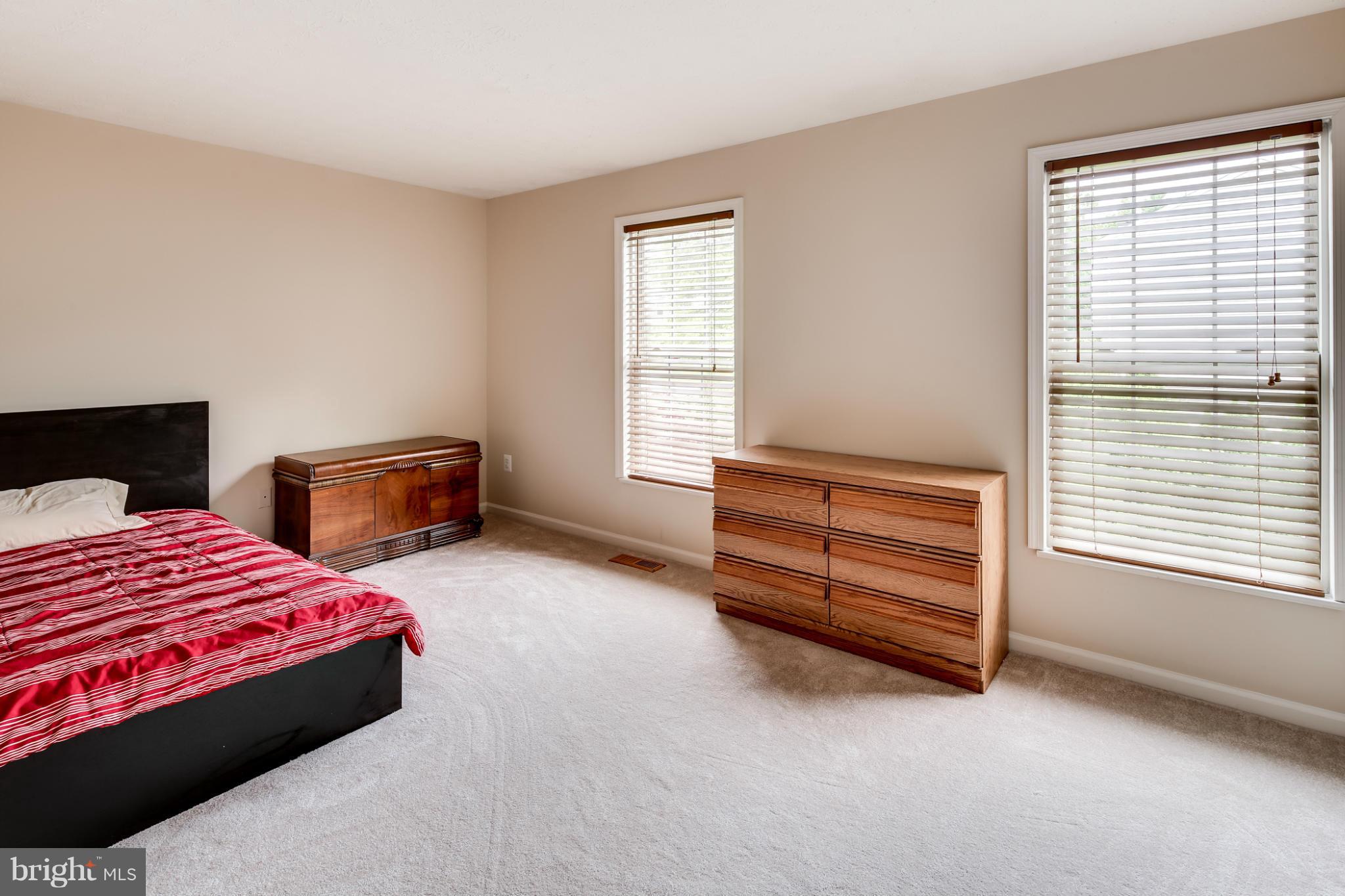 9539 Ridgeview Drive Columbia, MD 21046 - Photo 20 of 30 a bedroom with a bed and a window