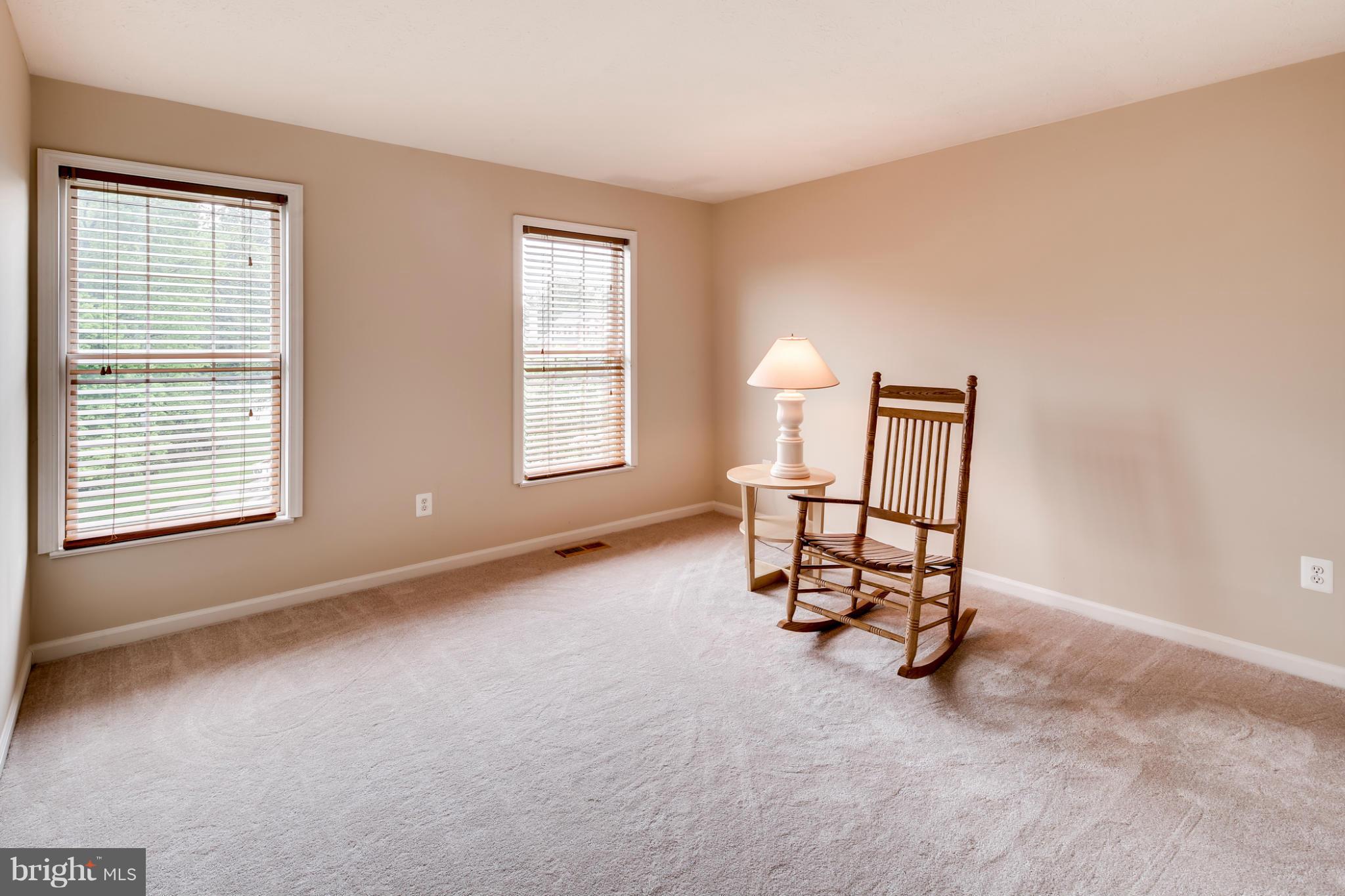 9539 Ridgeview Drive Columbia, MD 21046 - Photo 23 of 30 an empty room with windows and fan