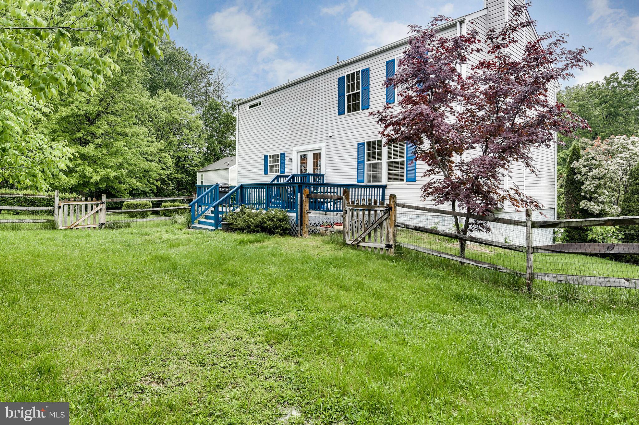9539 Ridgeview Drive Columbia, MD 21046 - Photo 29 of 30 a view of a house with a yard and sitting area