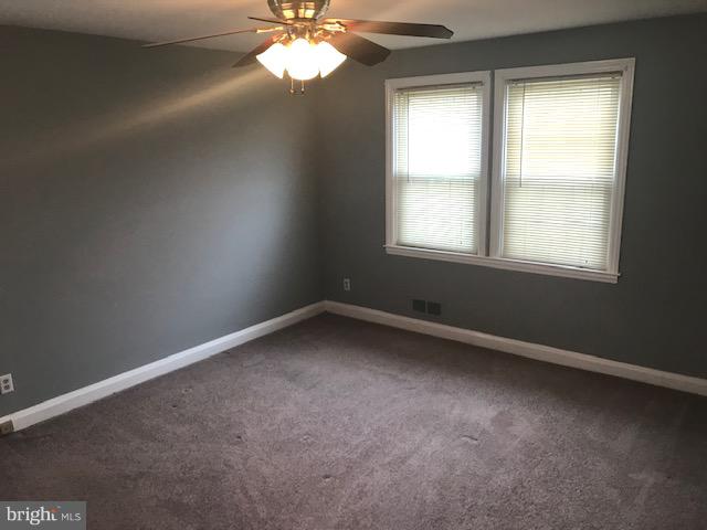 1001 Harwall Road Baltimore, MD 21207 - Photo 21 of 109 an empty room with a window