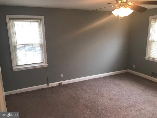 1001 Harwall Road Baltimore, MD 21207 - Photo 22 of 109 an empty room with a window