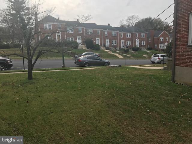 1001 Harwall Road Baltimore, MD 21207 - Photo 4 of 109 a front view of a house with garden