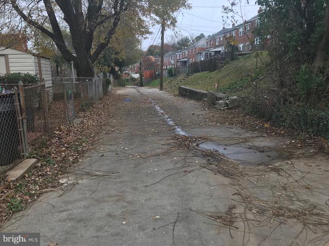 1001 Harwall Road Baltimore, MD 21207 - Photo 31 of 109 a view of a yard with a tree