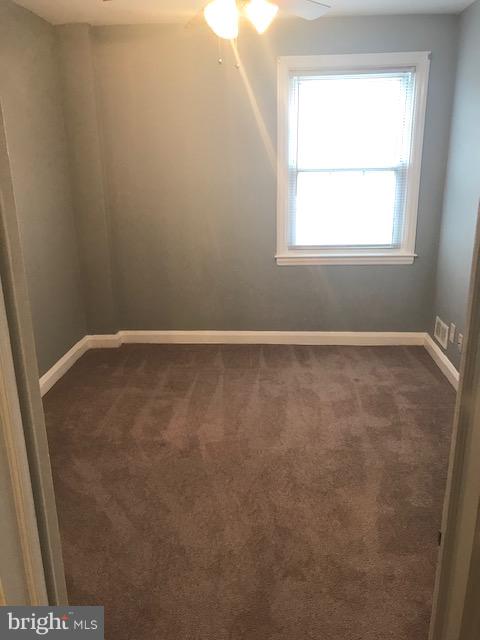 1001 Harwall Road Baltimore, MD 21207 - Photo 69 of 109 an empty room with a window