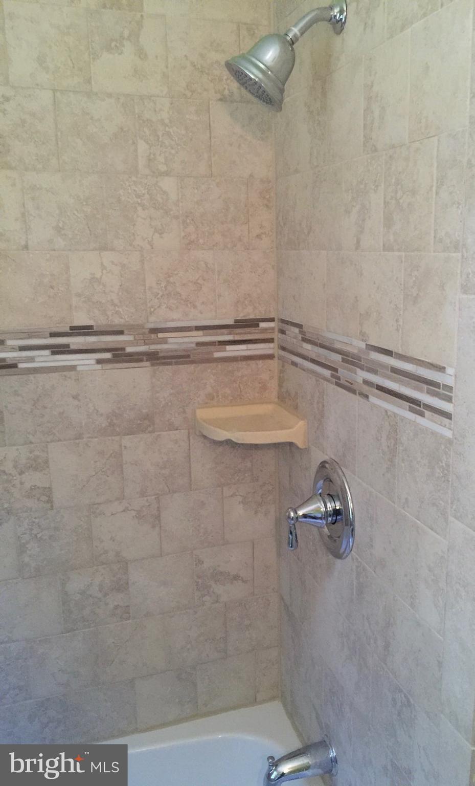 1001 Harwall Road Baltimore, MD 21207 - Photo 95 of 109 a bathroom with a shower
