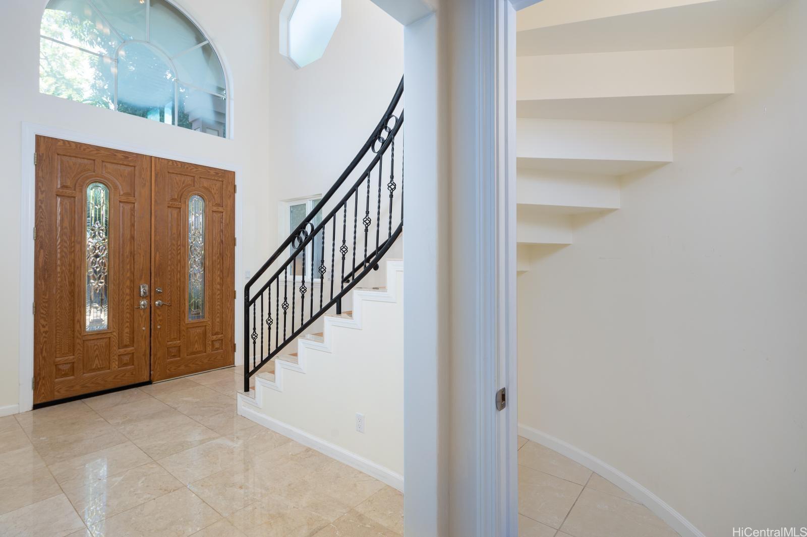 841 20th Avenue Honolulu, HI 96816 - Photo 3 of 17 a view of a hallway with wooden floor and entryway