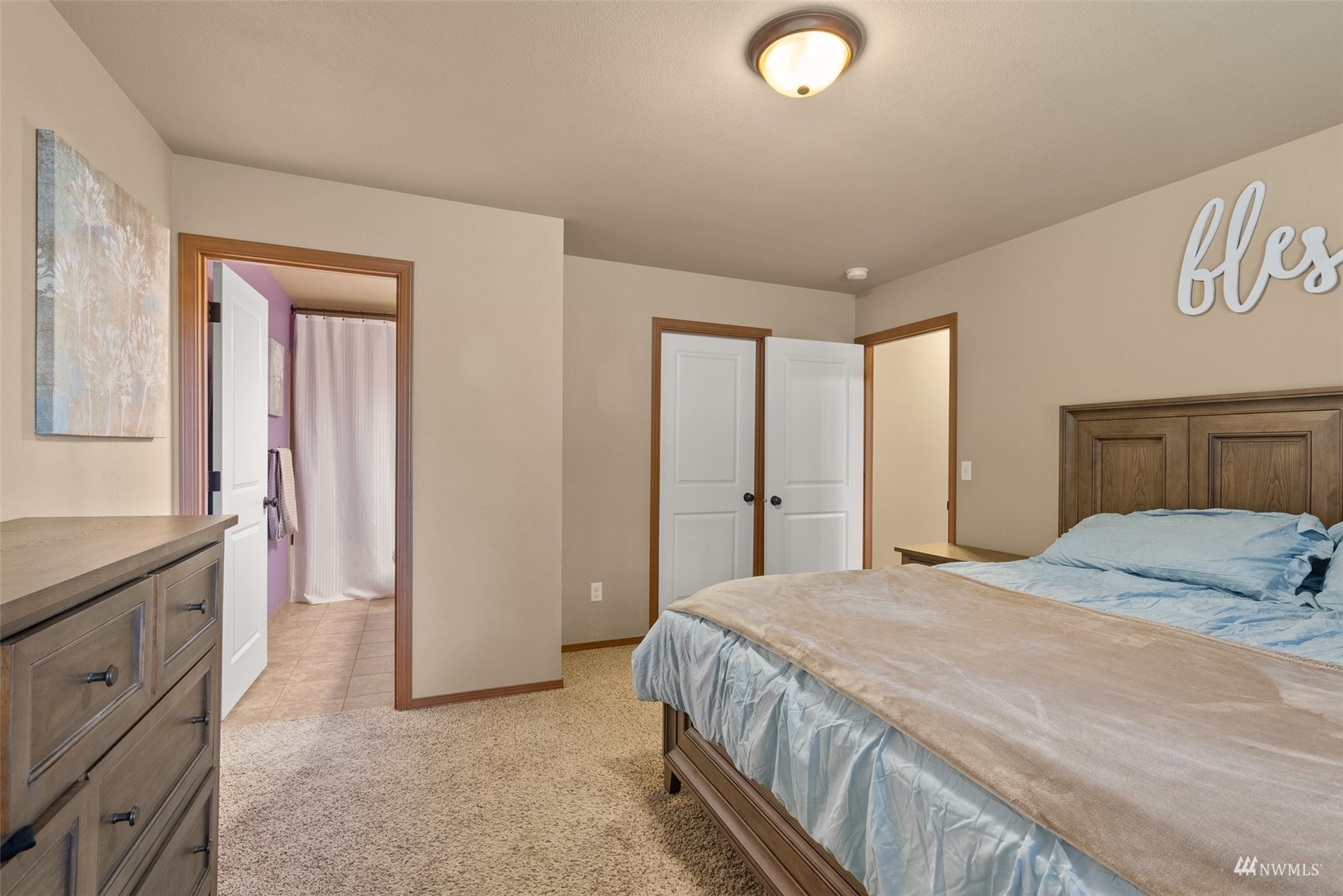 6320 192nd Lane Southwest Rochester, WA 98579 - Photo 17 of 30 a bedroom with a bed and a dresser