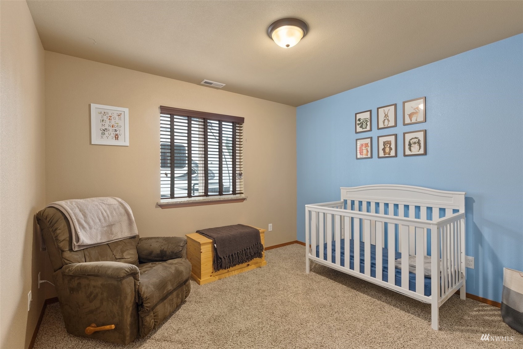 6320 192nd Lane Southwest Rochester, WA 98579 - Photo 20 of 30 a bedroom with furniture and a window