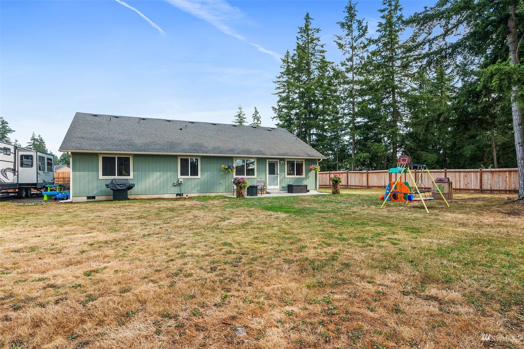 6320 192nd Lane Southwest Rochester, WA 98579 - Photo 25 of 30 a front view of a house with a yard