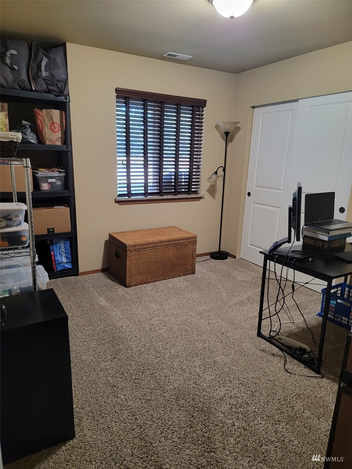 6320 192nd Lane Southwest Rochester, WA 98579 - Photo 30 of 30 a bedroom with furniture and a book shelf