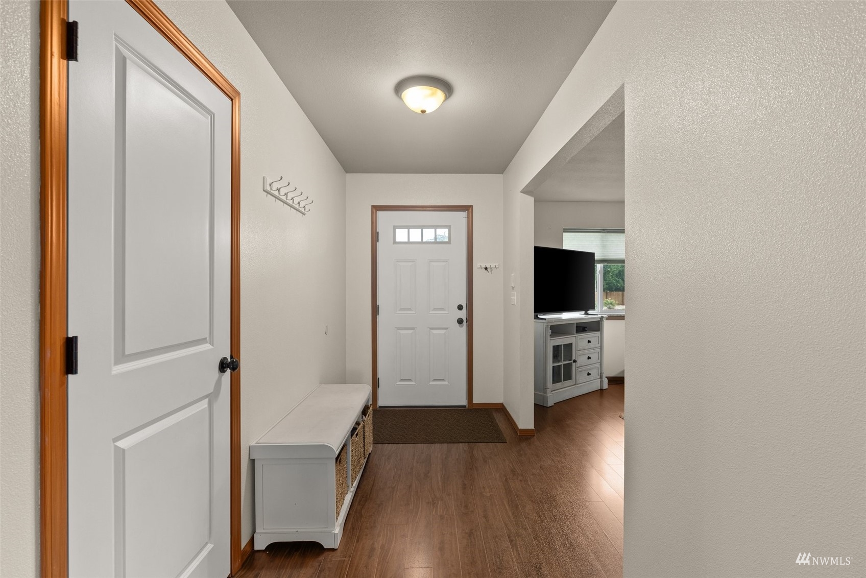6320 192nd Lane Southwest Rochester, WA 98579 - Photo 8 of 30 a view of a hallway view with wooden floor and furniture