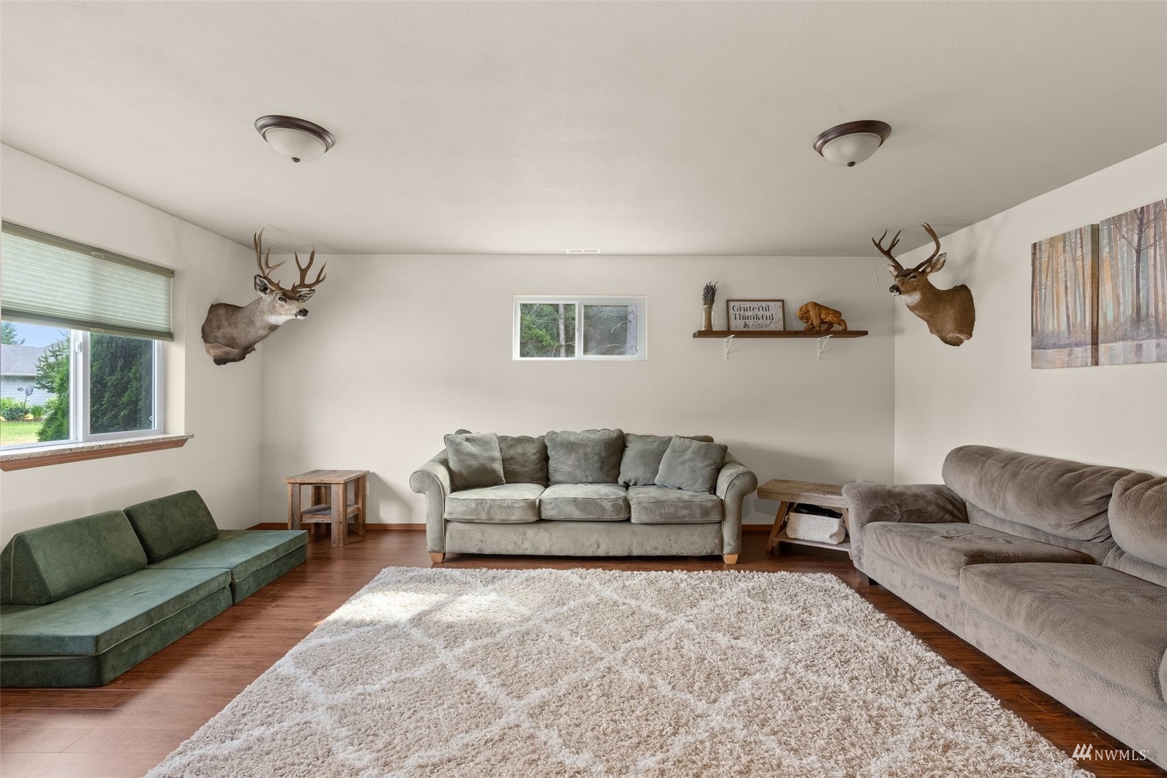 6320 192nd Lane Southwest Rochester, WA 98579 - Photo 9 of 30 a living room with furniture and a couch