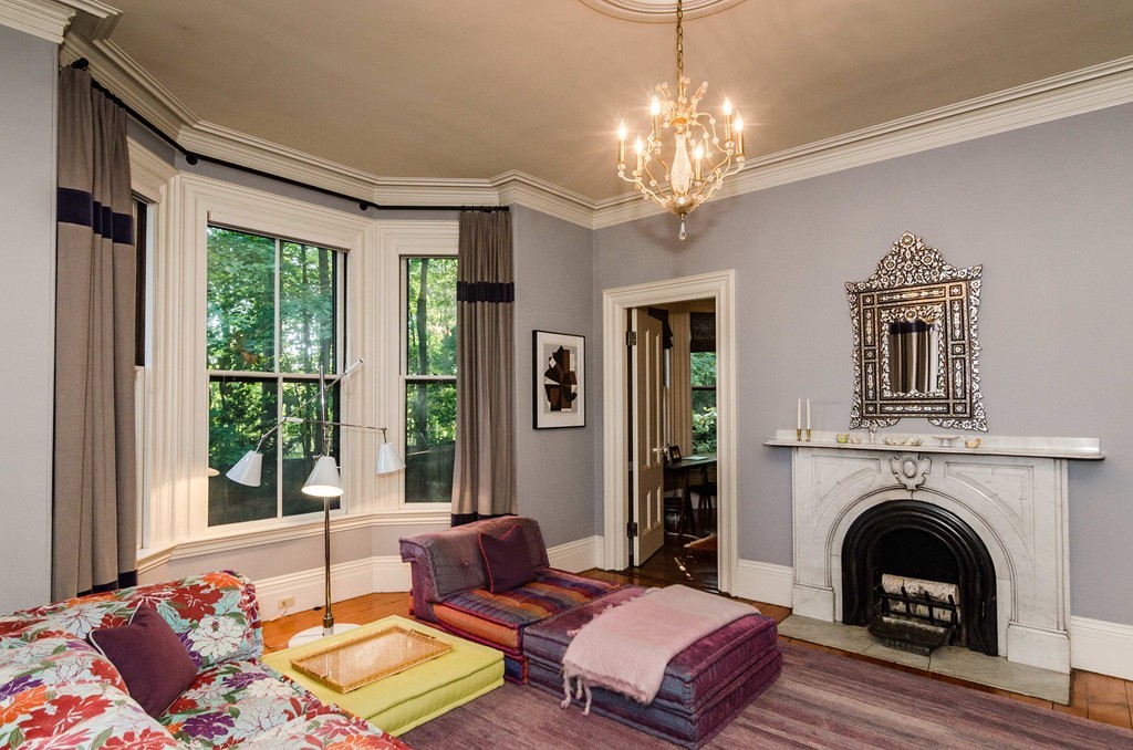 83 Elm Street Boston, MA 02130 - Photo 11 of 30 a living room with furniture and a fireplace