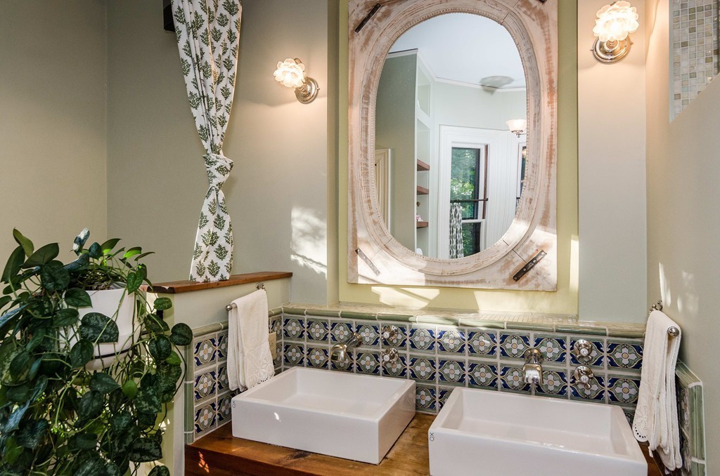 83 Elm Street Boston, MA 02130 - Photo 20 of 30 a bathroom with a sink and a mirror