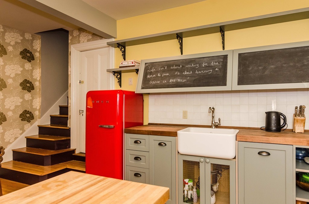 83 Elm Street Boston, MA 02130 - Photo 24 of 30 a view of bathroom with a sink and a mirror