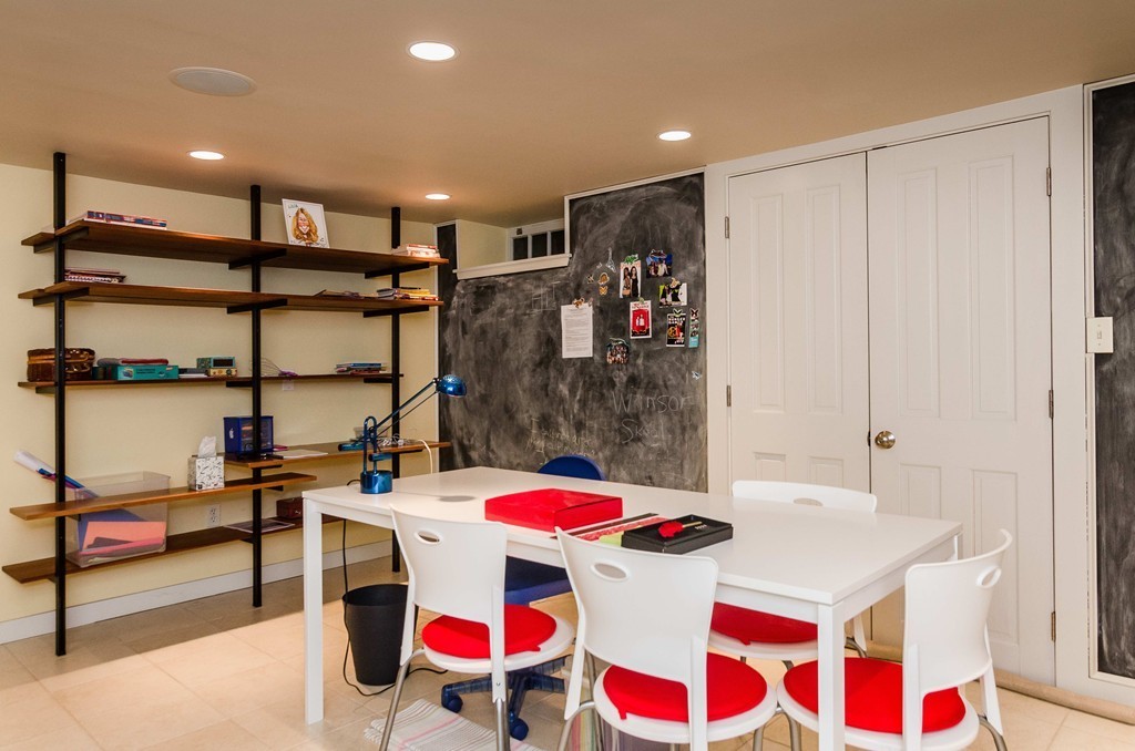 83 Elm Street Boston, MA 02130 - Photo 27 of 30 a very nice looking room with a dining table chairs