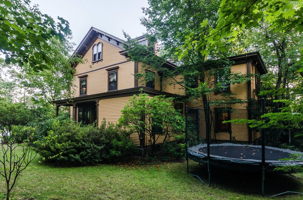 83 Elm Street Boston, MA 02130 - Photo 30 of 30 a front view of a house with garden