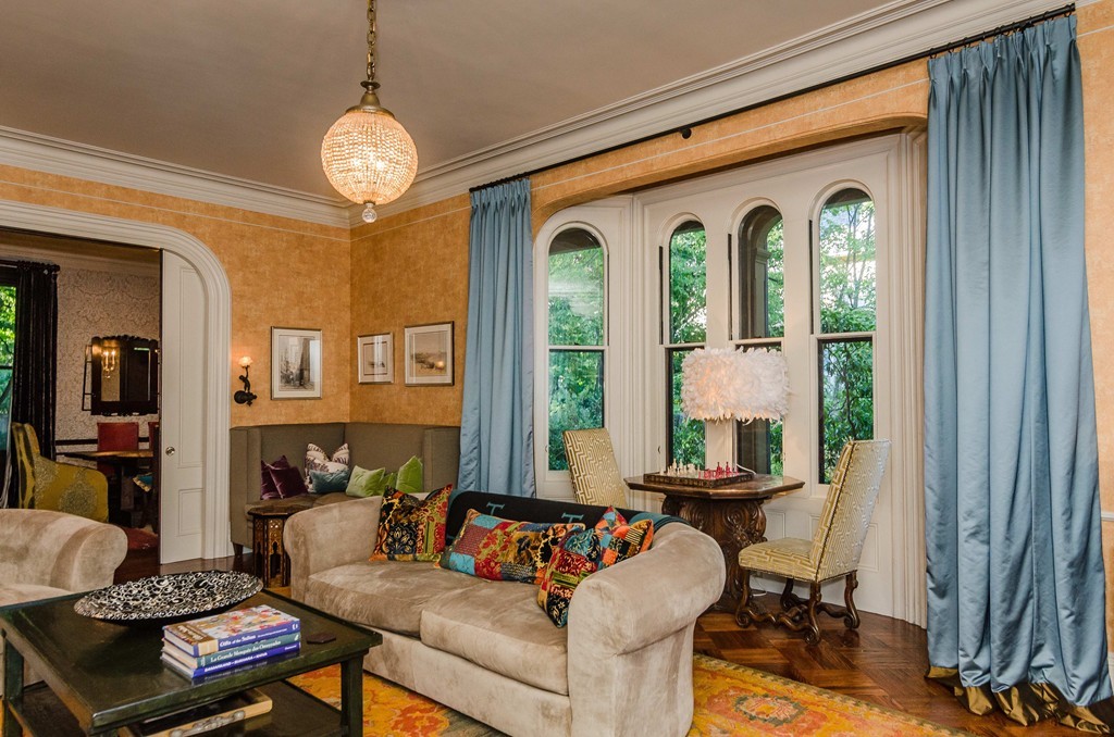83 Elm Street Boston, MA 02130 - Photo 3 of 30 a living room with furniture and a large window