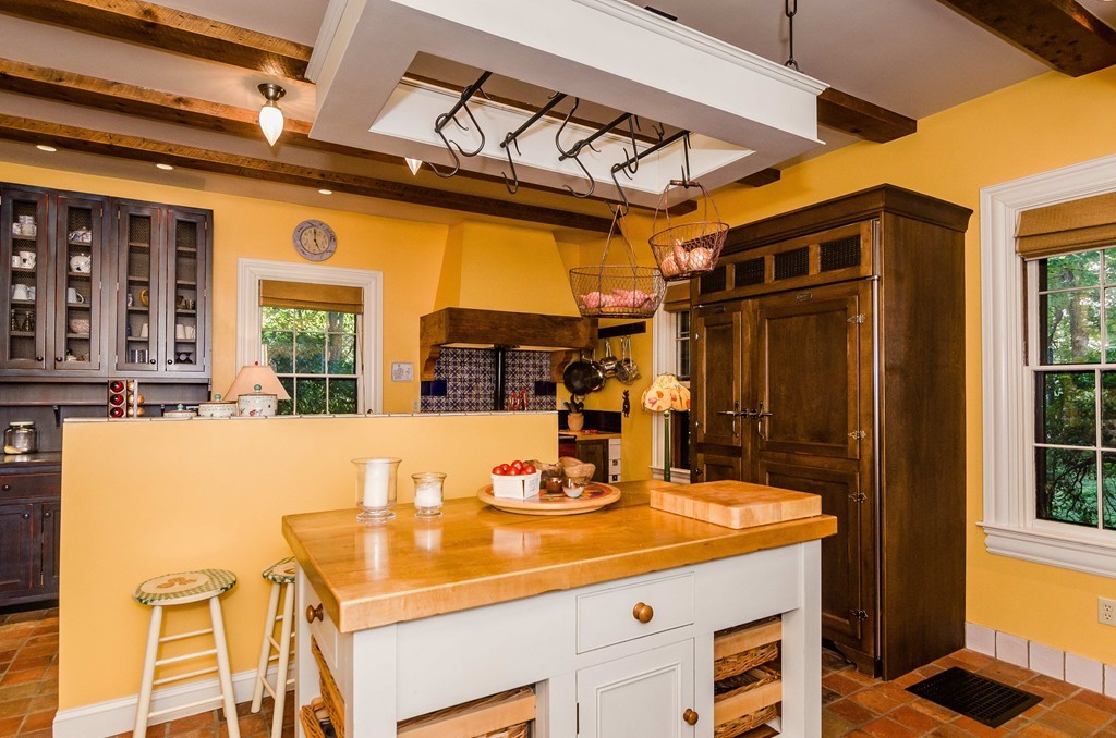 83 Elm Street Boston, MA 02130 - Photo 10 of 30 a bathroom with a sink and a mirror